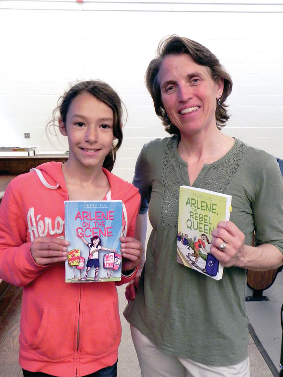 FRIENDS OF ARLENE: Sherman School fifth grader Fallon Neves was one of the kids introduced to Carol Liu and her fictional friend Arlene last week. Liu is a former Sherman student whose book, “Arlene on the Scene” has been introducing young readers to Charcot-Marie-Tooth disease and a grade-school kid who is coping with it.