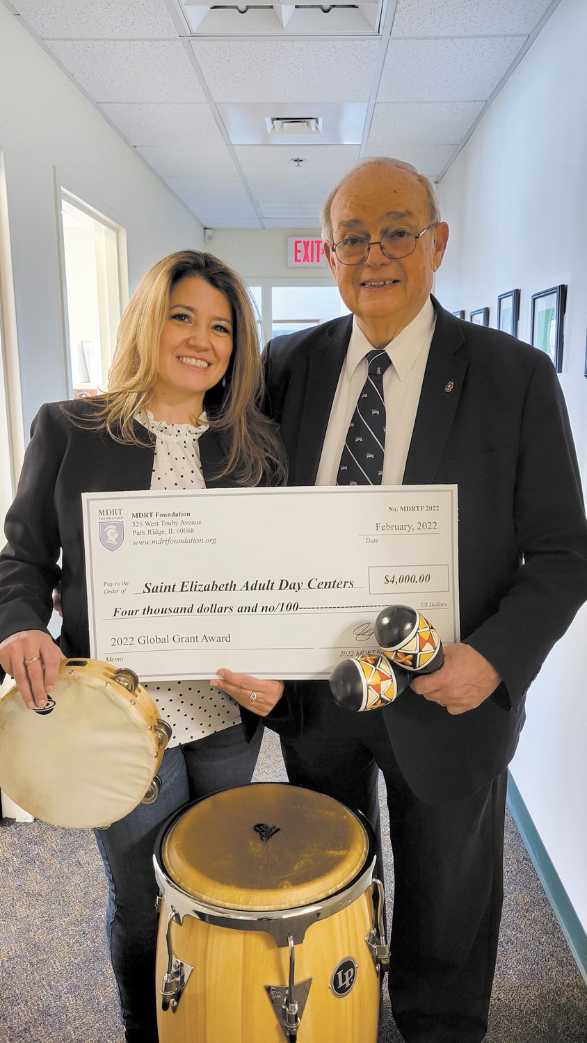 FOR PROGRAM:  Saint Elizabeth Adult Day Centers Director Jessica Gosselin is pictured with William Palmisciano, a member of MDRT. (Submitted photo)